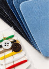 Reparatieset met patches en naaigerei